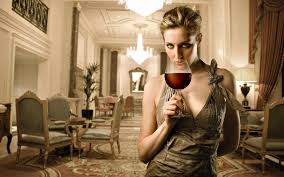 Woman in Ball Gown drinking glass of wine